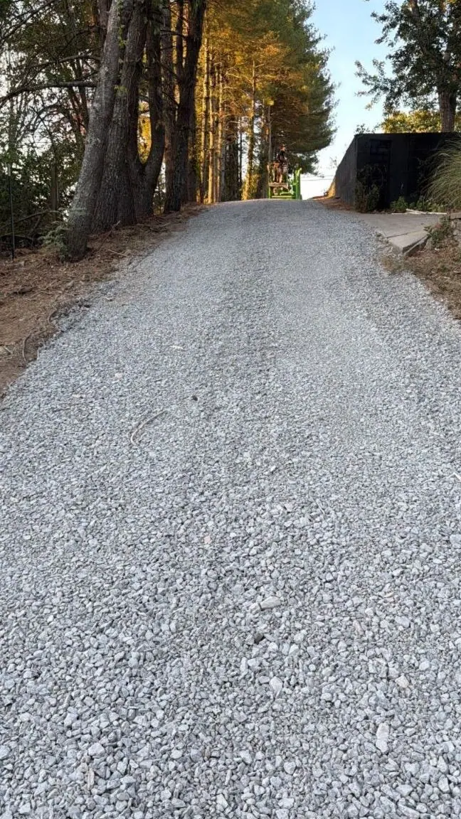 Same driveway after: regraded and leveled with fresh gravel