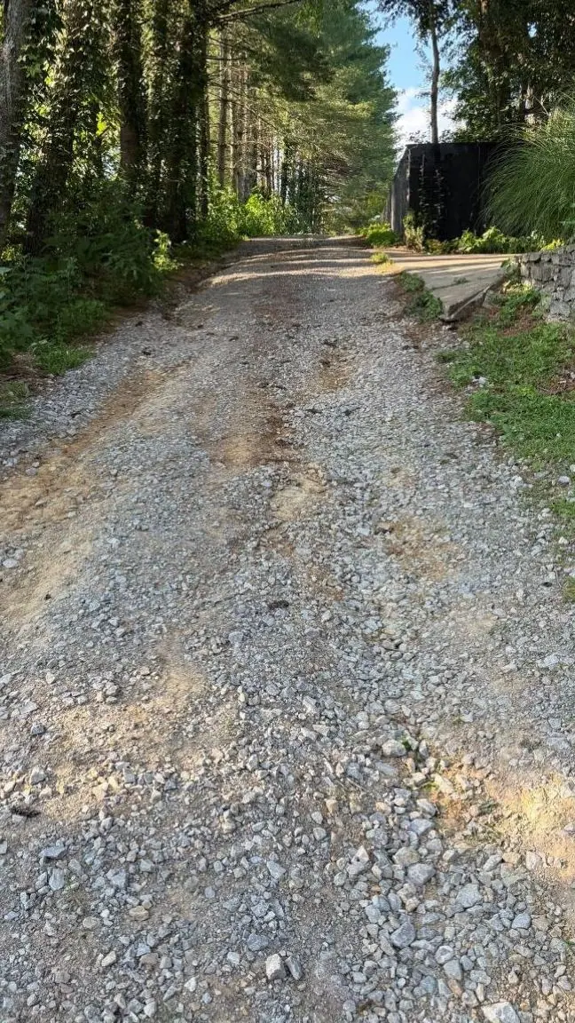 Gravel driveway before: packed, rutted and patchy